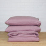 linen duvet set in woodrose color. Includes duvet cover and two pillowcases
